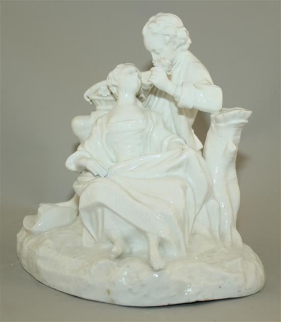 A Continental white glazed porcelain group of two lovers, late 19th century, 19cm, slight restoration